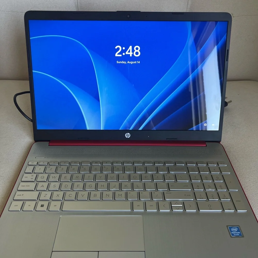 HP Computer, Red And Silver, fairly new and barley used